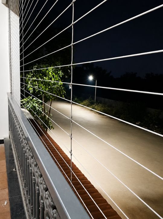 SJ Pigeon Nets team installing invisible grills at a Bangalore apartment